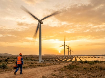 Wind turbines on a green landscape